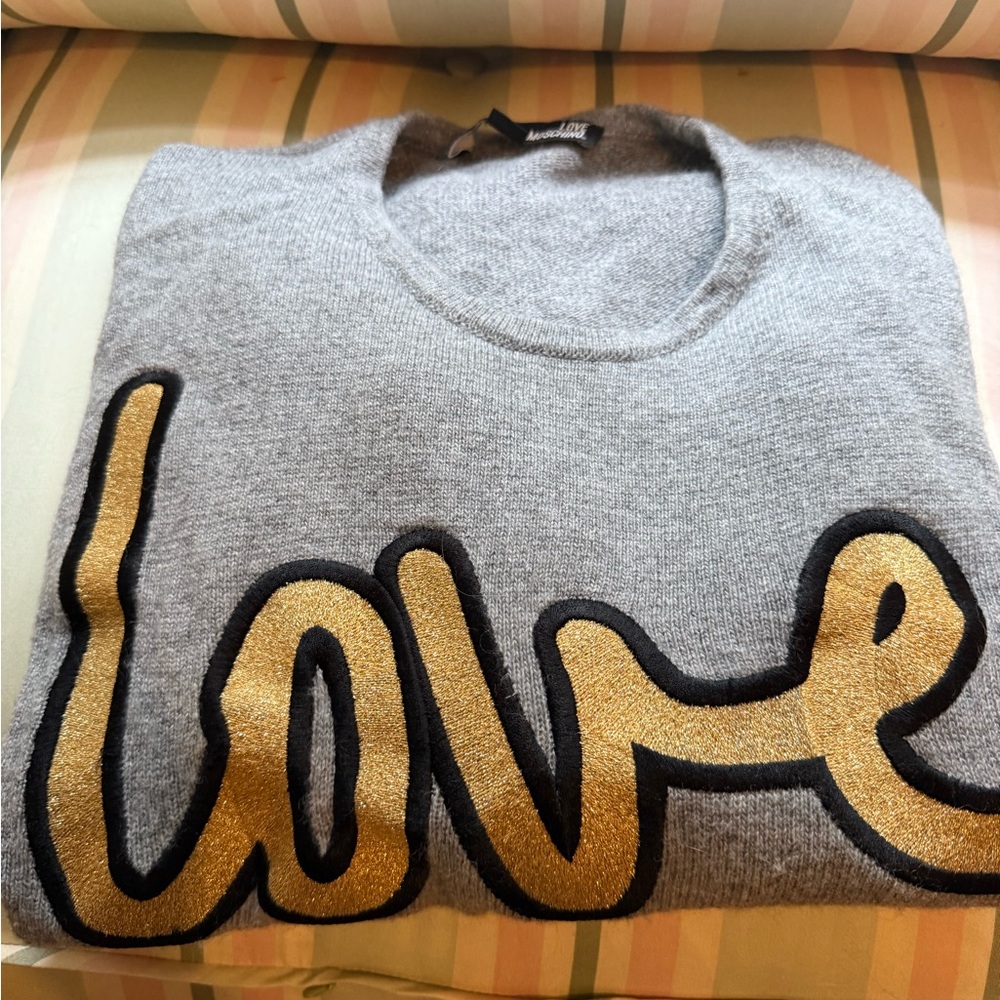 Valentine’s Day is coming! Love Moschino Gray sweater with gold patch